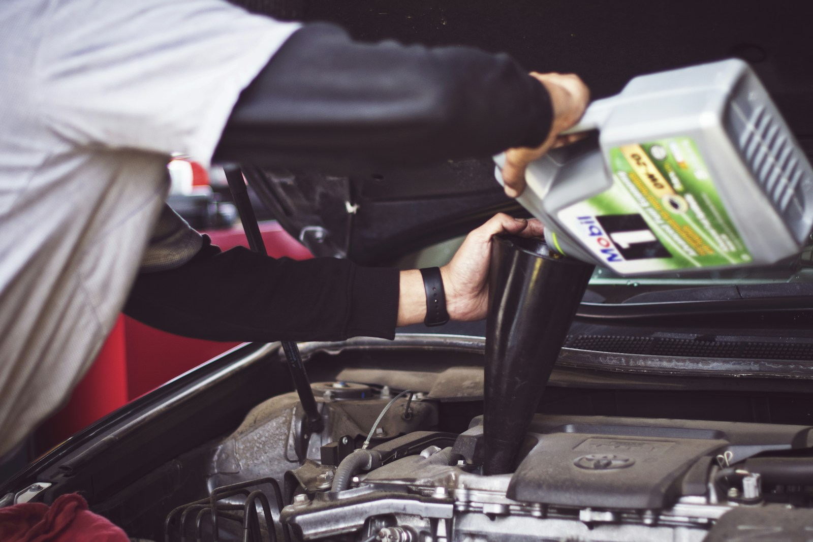Mechanic working in a professional automotive repair shop